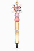 God Don't Play About Me beaded pen with gold body, pink pearl and matte beads, rhinestone rondelles, and jeweled cross tile charm